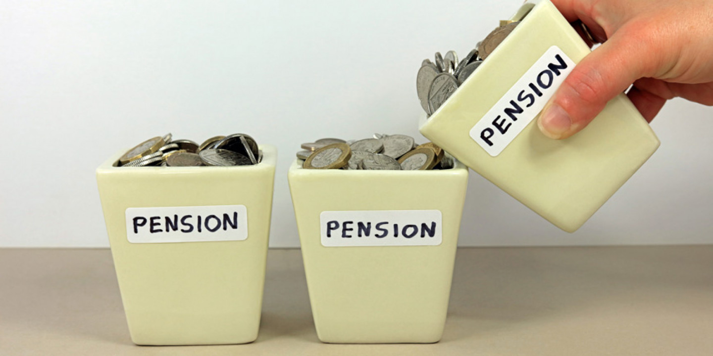 A Hand Tipping A Pension Pot In To Another.